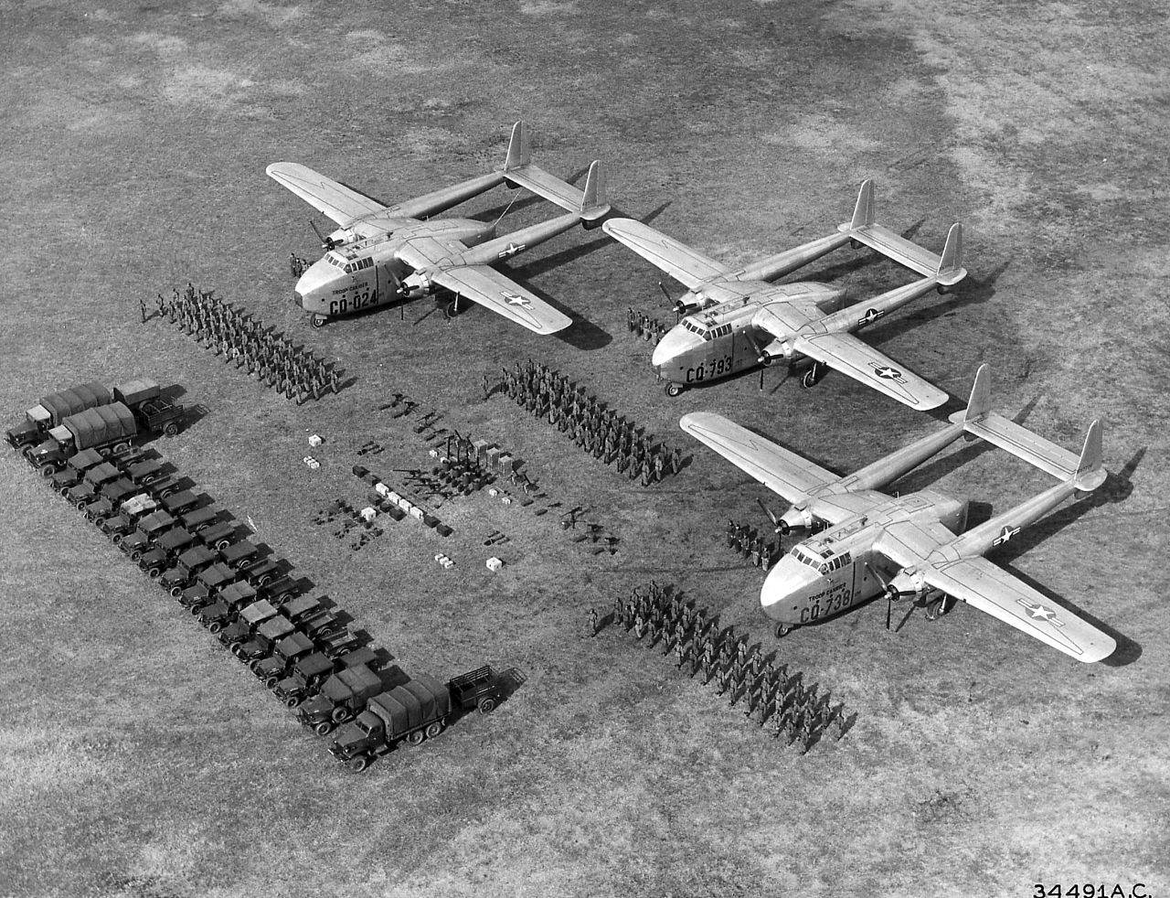 Three C-82s and various troops and cargo in 1948